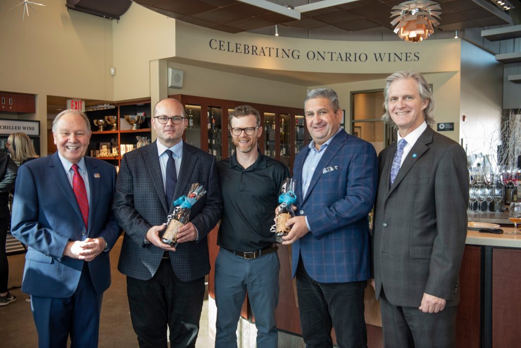 Canopy Growth's Jeff Ryan, second from the left, celebrates a new partnership with Niagara College's Teaching Winery. (Photo courtesy: Niagara College, Facebook)